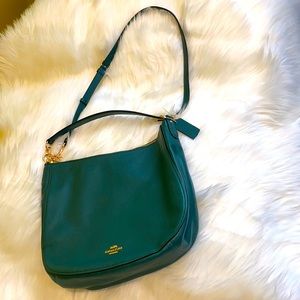 Coach Authentic crossbody bag. Green color. Still in pristine condition.